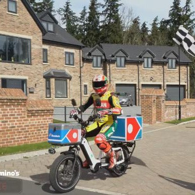 Motorcycle Legend Peter Hickman Delivers Domino's on Benzinan Zero HAULeR electric bike